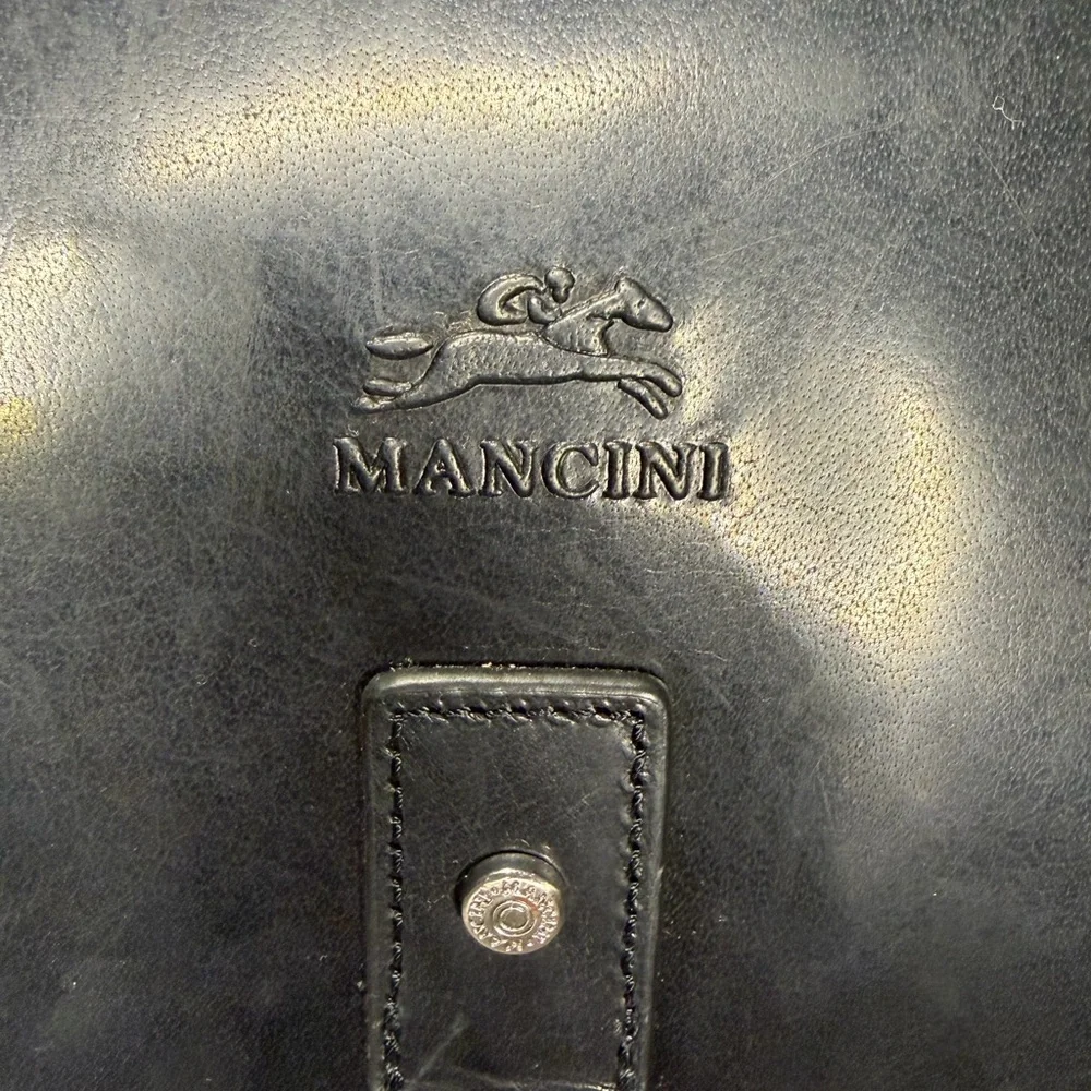 N/A mancini messenger